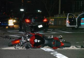 shooting victim hits motorcyclist