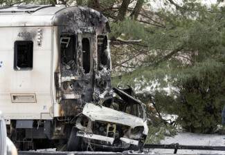 widow sues over train crash